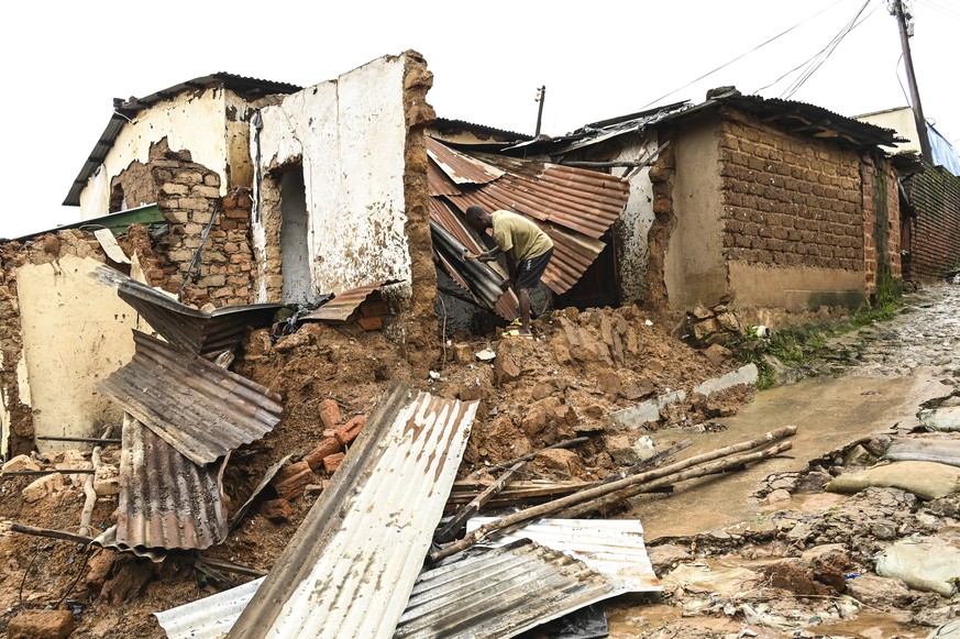 A man checks the damage to his home, destroyed following heavy rain caused by Cyclone Freddy, in Blantyre southern Malawi, Wednesday, March 15, 2023. From devastating cyclones and floods to an unrelen ...