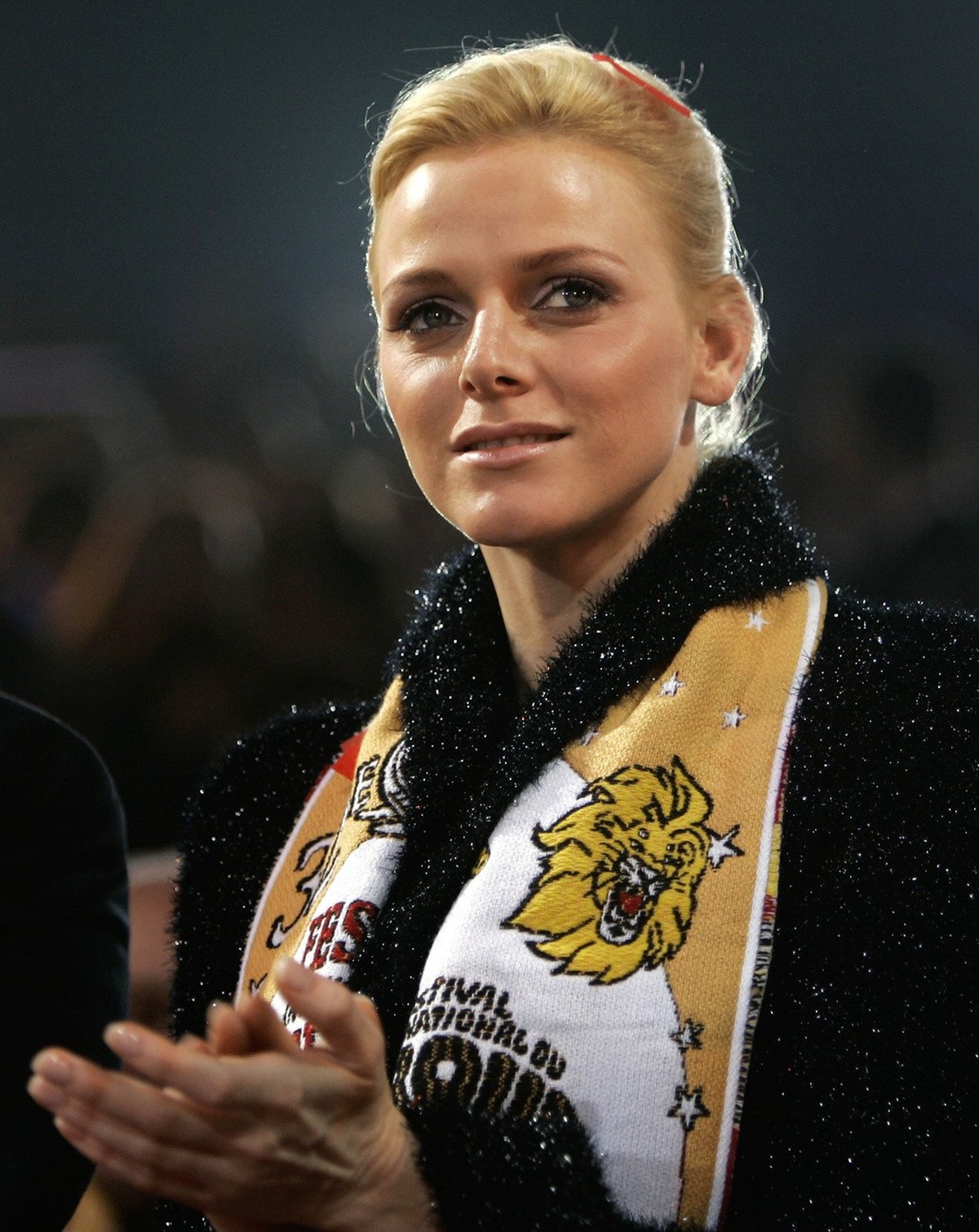 South Africa's Charlene Wittstock, a friend of Prince Albert II of Monaco, claps hands during the closing ceremony of the 32nd Monte Carlo International Circus Festival in Monaco, Tuesday, Jan. 2 ...