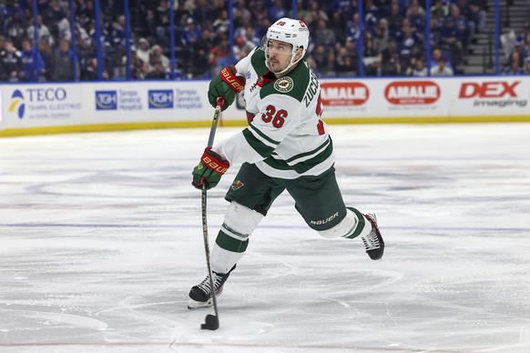 Minnesota Wild&#039;s Mats Zuccarello shoots against the Tampa Bay Lightning during the third period of an NHL hockey game Thursday, Jan. 18, 2024, in Tampa, Fla. (AP Photo/Mike Carlson)
Mats Zuccarel ...
