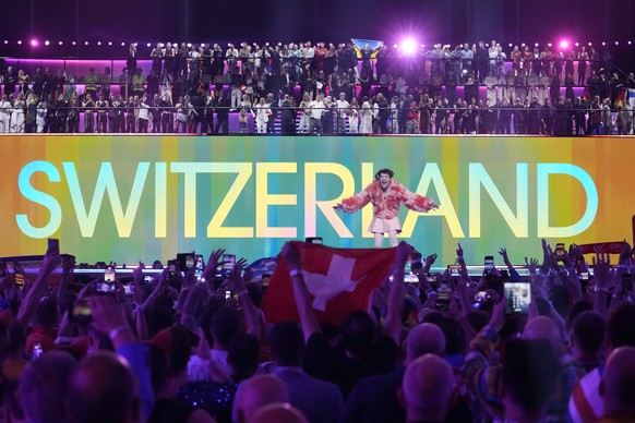 Nemo of Switzerland, who performed the song The Code, celebrates after winning the Grand Final of the Eurovision Song Contest in Malmo, Sweden, Sunday, May 12, 2024. (AP Photo/Martin Meissner)
Bambie  ...