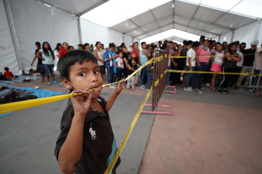 epa07143798 A child in the sport center Jesus Martinez Palillo, in Mexico City, Mexico, 05 November 2018. The caravan of Central Americans will meet in Mexico City on the next days to decide if contin ...