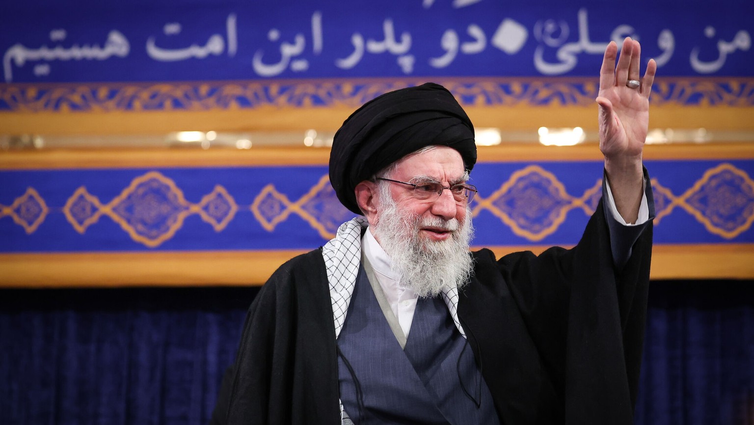 epa12622671 A handout picture made available by Iran's Supreme Leader Office shows Ayatollah Ali Khamenei greeting a crowd during a ceremony in Tehran, Iran, 03 January 2026. Khamenei commented o ...