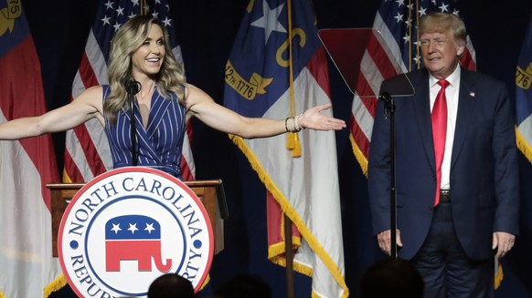 Former President Donald Trump, right, listens as his daughter-in-law Lara Trump speaks at the North Carolina Republican Convention Saturday, June 5, 2021, in Greenville, N.C. Lara is from North Caroli ...