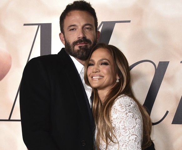 Cast member Jennifer Lopez, right, and Ben Affleck attend a photo call for a special screening of &quot;Marry Me&quot; at DGA Theater on Tuesday, Feb. 8, 2022, in Los Angeles. (Photo by Jordan Strauss ...