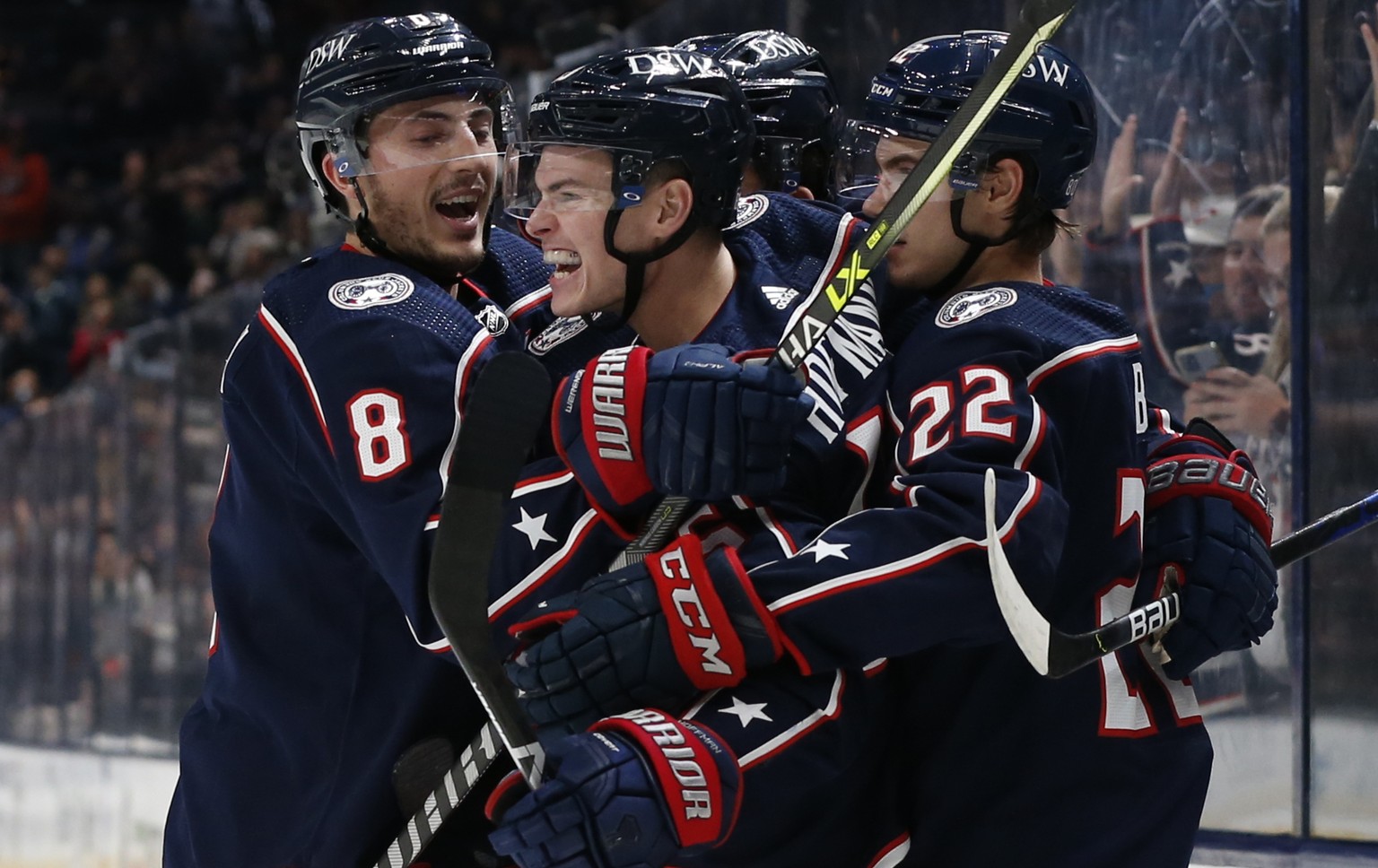 Columbus Blue Jackets' Gregory Hofmann, center, celebrates his goal against the Dallas Stars during the second period of an NHL hockey game Monday, Oct. 25, 2021, in Columbus, Ohio. (AP Photo/Jay LaPr ...