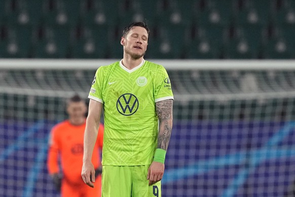 Wolfsburg's Wout Weghorst reacts during the Champions League group G soccer match between VfL Wolfsburg and Lille OSC in Wolfsburg, Germany, Wednesday, Dec. 8, 2021. (AP Photo/Martin Meissner)