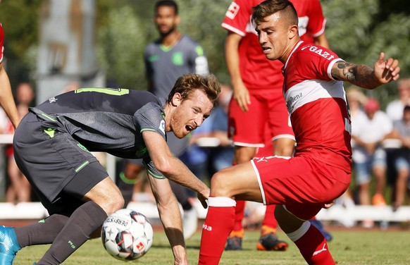 epa06943483 Stuttgart&#039;s Pablo Maffeo (R) in action against Real Sociedad&#039;s David Zurutuza (C) during the friendly test soccer match between VfB Stuttgart and Real Sociedad San Sebastian in W ...