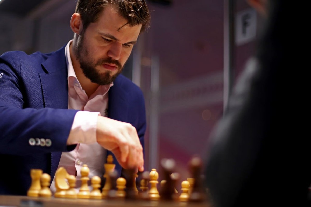KATWIJK AAN ZEE, NETHERLANDS - JANUARY 16: Magnus Carlsen of Norway competes against Daniil Dubov of Russia during the 82nd Tata Steel Chess Tournament held at the home of PSV football club, Philips S ...
