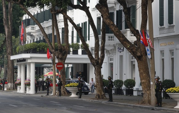 epa07400295 Security personnel stand guard in front of Sofitel Legend Metropole Hanoi hotel, where the US President and the North Korean leader are expected to meet for the second US-North Korea summi ...