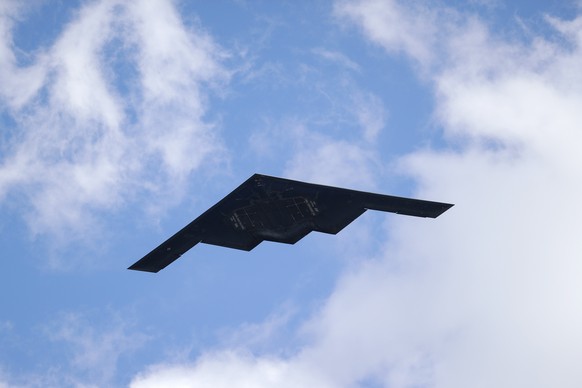 FILE - A B-2 Spirit stealth bomber assigned to Whiteman Air Force Base's 509th/131st Bomb Wings performs a flyover over Barnes-Jewish Hospital to honor healthcare professionals and essential…