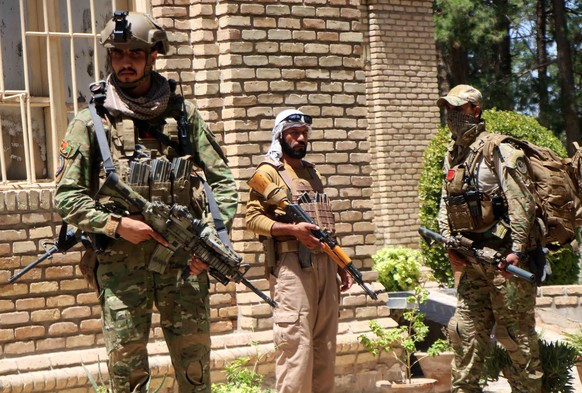 epa09385893 Afghan security officials arrive as part of a reinforcement to fight against Taliban militants as they push to gain access to the city in Herat, Afghanistan, 01 August 2021. After two days ...