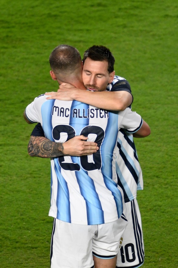 Argentina's Lionel Messi (10) embraces Argentina's Alexis Mac Allister (20) after the World Cup Group J soccer match between Argentina and Algeria in Kansas City, Mo., Tuesday, June 16, 2026 ...