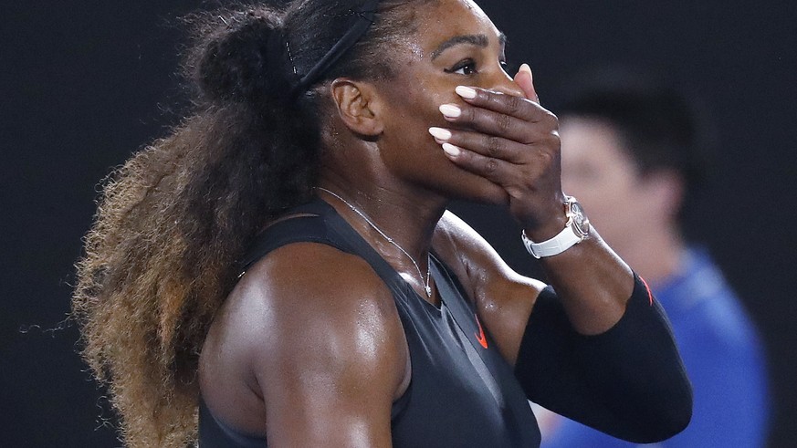 FILE - In this Jan. 28, 2017, file photo, Serena Williams covers her face after defeating her sister, Venus, in the women&#039;s singles final at the Australian Open tennis championships in Melbourne, ...