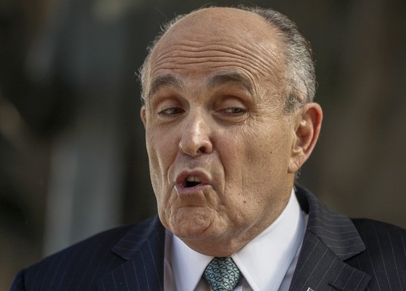 FILE - In this Oct. 16, 2014 file photo, lawyer and former New York City Mayor Rudy Giuliani calls for the dismissal of a lawsuit filed against video game giant Activision by former Panamanian dictato ...