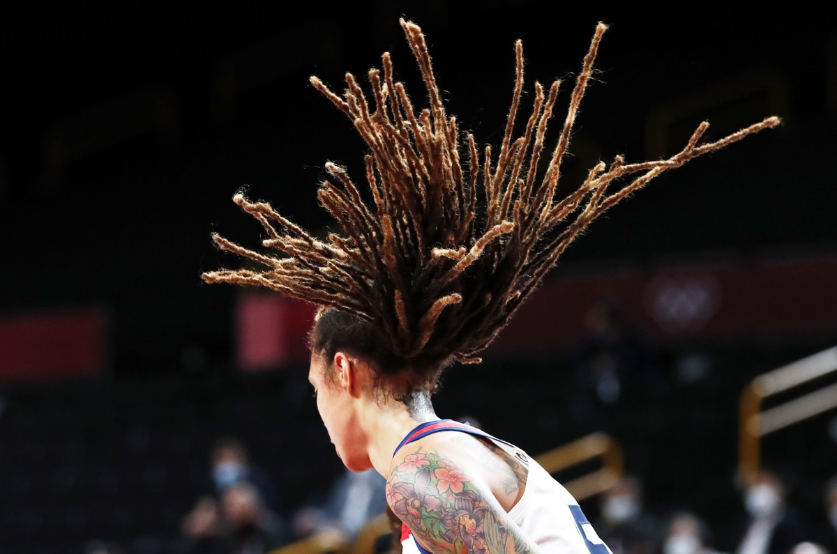 epaselect epa09405129 Brittney Griner of the US turns away from the basket after scoring during the Women's Basketball Gold medal match between USA and Japan at the Tokyo 2020 Olympic Games at th ...