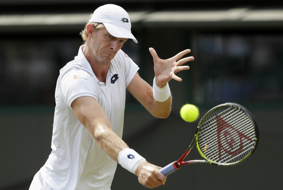 Kevin Anderson of South Africa returns the ball to Gael Monfils of France during their men&#039;s singles match on the seventh day at the Wimbledon Tennis Championships in London, Monday July 9, 2018. ...