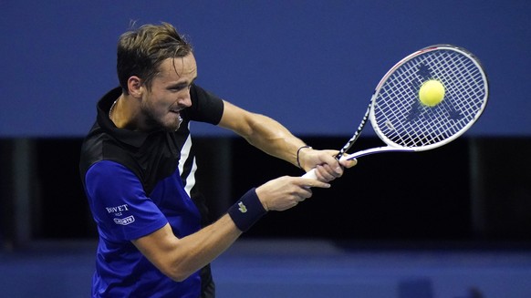 Daniil Medvedev, of Russia, returns to Frances Tiafoe, of the United States, during the fourth round of the US Open tennis championships, Monday, Sept. 7, 2020, in New York. (AP Photo/Frank Franklin I ...