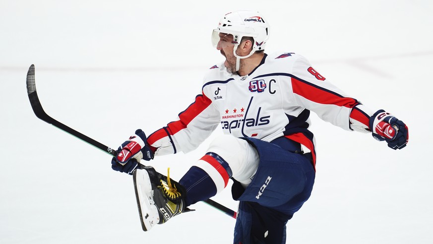 Washington Capitals&#039; Alex Ovechkin celebrates after his winning goal against the Ottawa Senators during third-period NHL hockey game action in Ottawa, Ontario, Thursday, Jan. 16, 2025. (Sean Kilp ...