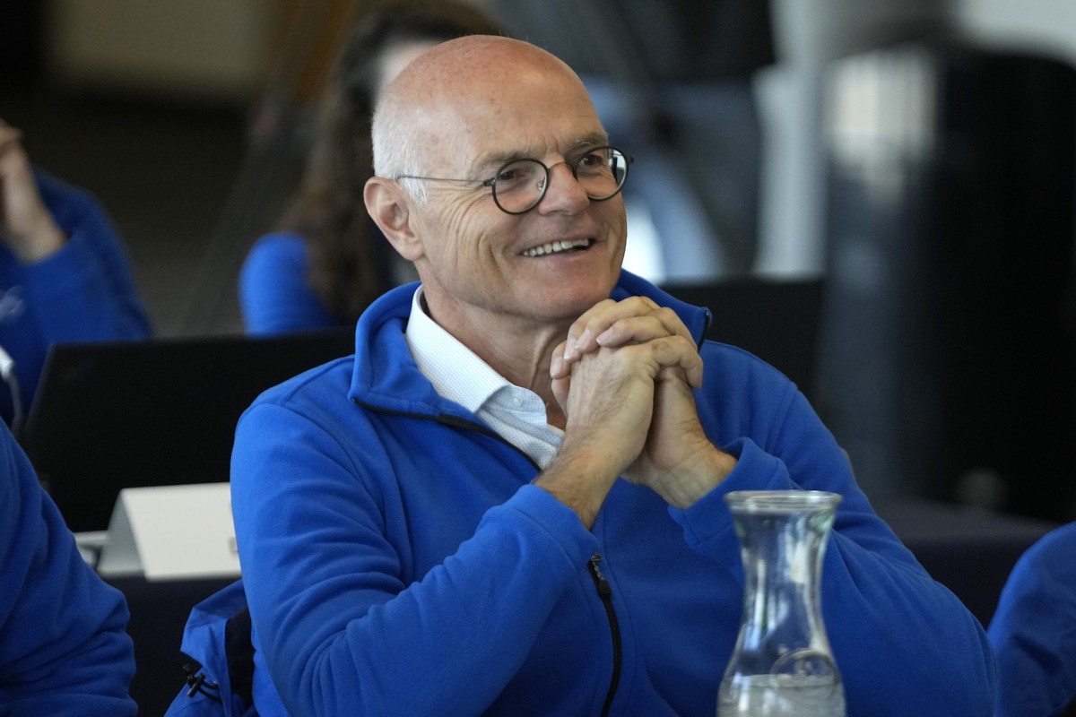 Karl Stoss, chairman of the International Olympic Committee's Future Host Commission, listens during future host commission presentation Wednesday, April 10, 2024, in Salt Lake City. Salt Lake Ci ...