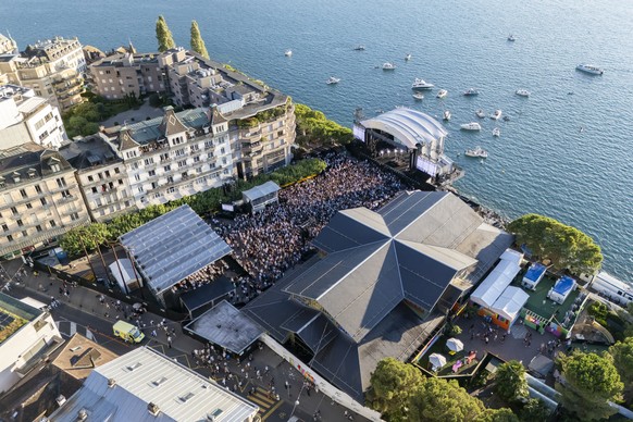 epa12243872 A aerial view during the concert of Hermanos Gutierrez as he performs on the Lake stage at the 59th Montreux Jazz Festival (MJF), in Montreux, Switzerland, Thursday, July 17, 2025. EPA/CYR ...