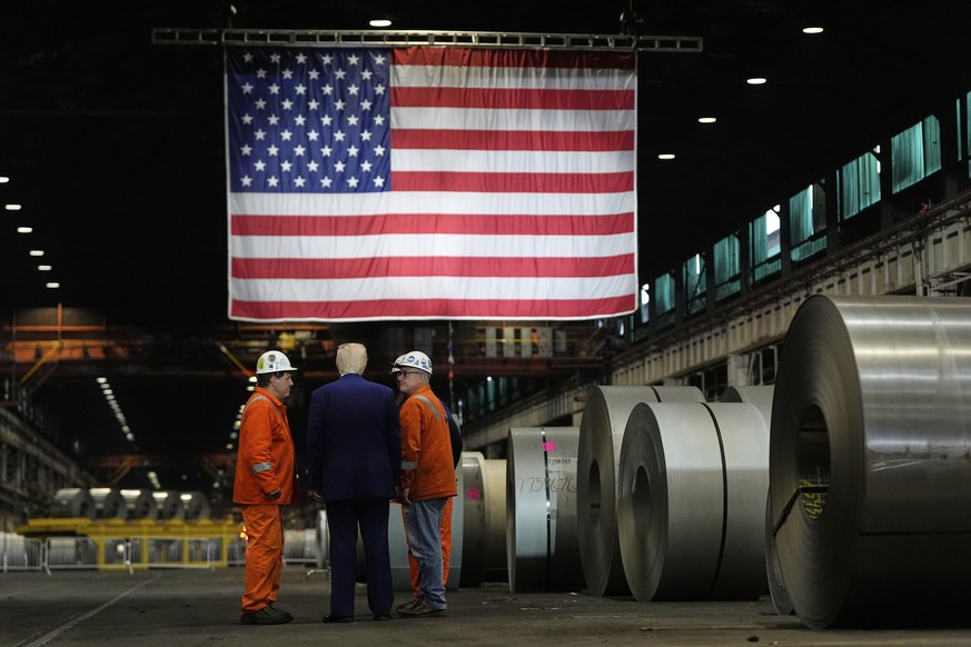 President Donald Trump talks to workers as he tours U.S. Steel Corporation&#039;s Mon Valley Works-Irvin plant, Friday, May 30, 2025, in West Mifflin, Pa. (AP Photo/Julia Demaree Nikhinson)
Trump