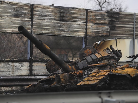 epa09801401 A destroyed tank in the city of Makariv near Kiev (Kyiv), Ukraine, 04 March 2022. Russian troops entered Ukraine on 24 February leading to a massive exodus of Ukrainians to neighboring cou ...