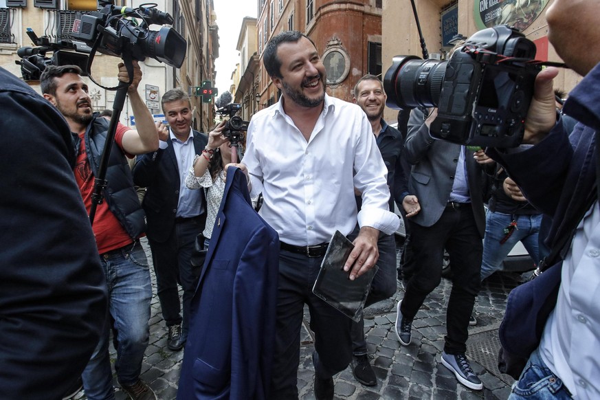 epa06725668 Leader of Lega party Matteo Salvini (C) leaves after a meeting close to Montecitorio in Rome, Italy, 10 May 2018. The leader of the 5 Star Movement (M5S), Luigi Di Maio, and the leader of  ...
