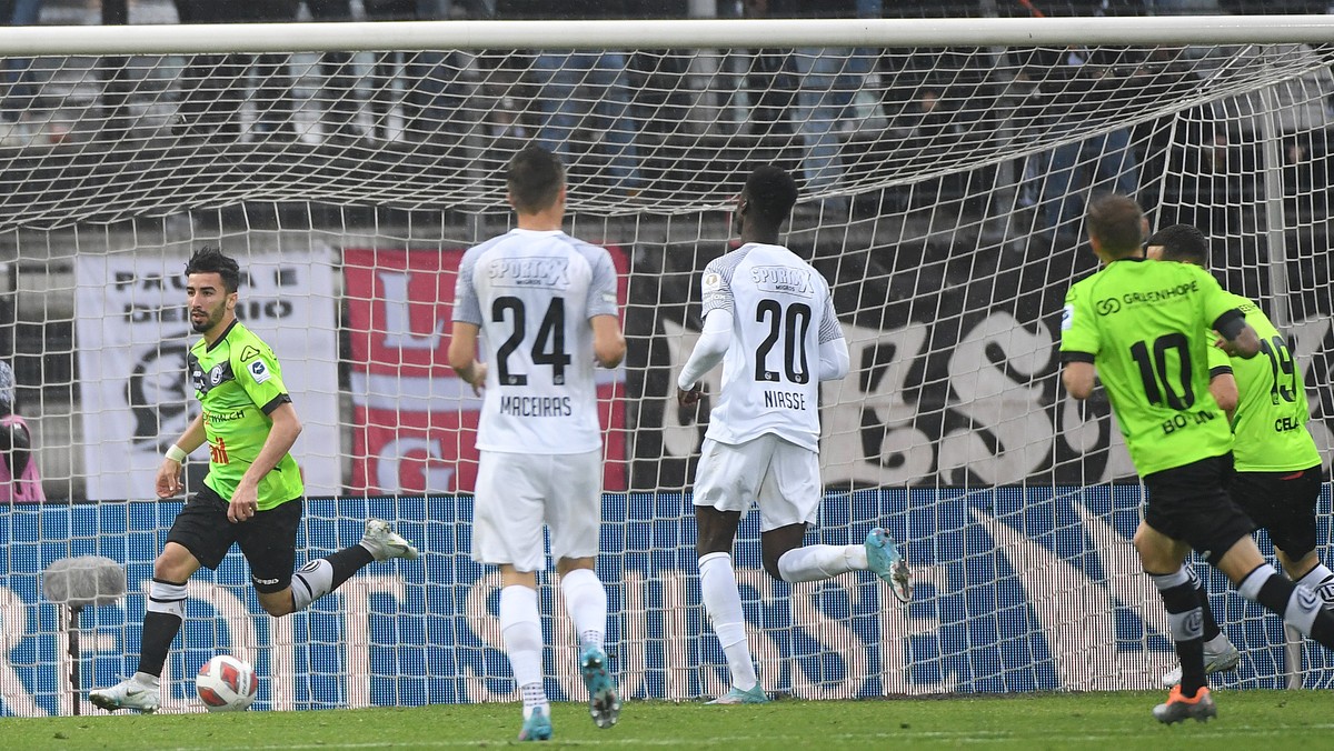 Lugano's playerMohamed Amoura left make the 1 - 1 goal, during the Super League soccer match FC Lugano against Young Boys at the Cornaredo stadium in Lugano, Saturday, May 07, 2022. .(KEYSTONE-AT ...
