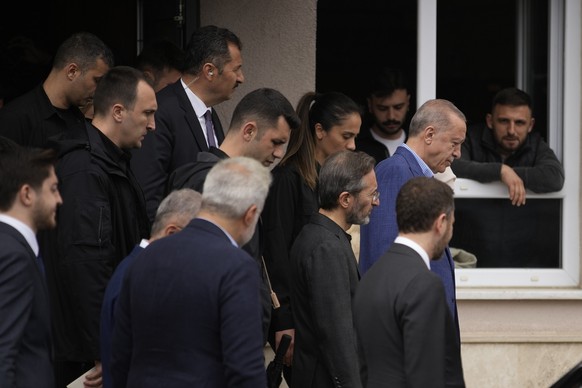 Turkish President and People's Alliance's presidential candidate Recep Tayyip Erdogan, leaves after voting at a polling station in Istanbul, Turkey, Sunday, May 28, 2023. Erdogan, who has be ...