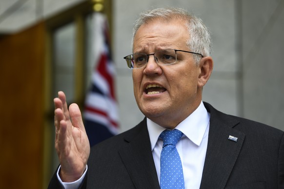epa09550059 Australian Prime Minister Scott Morrison speaks to the media during press conference at Parliament House in Canberra, Australia, 28 October 2021. EPA/LUKAS COCH AUSTRALIA AND NEW ZEALAND O ...