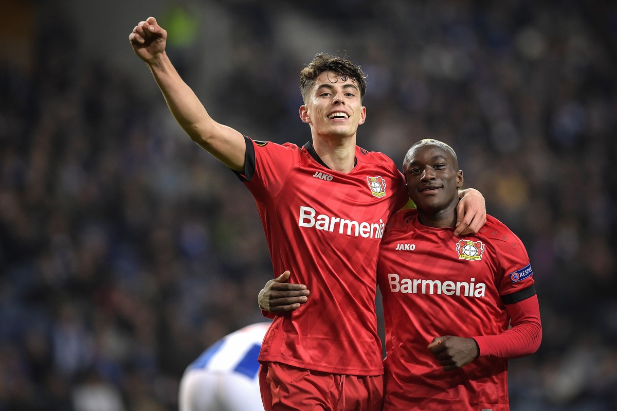 epa08253393 Leverkusen's Kai Havertz (L) and Chancel Mbemba celebrate the third goal against FC Porto during their UEFA Europa League round of 32, 2nd leg, soccer match held at Dragao Stadium in  ...