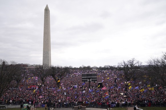 People attend a rally in support of President Donald Trump, Wednesday, Jan. 6, 2021, in Washington. (AP Photo/Evan Vucci)