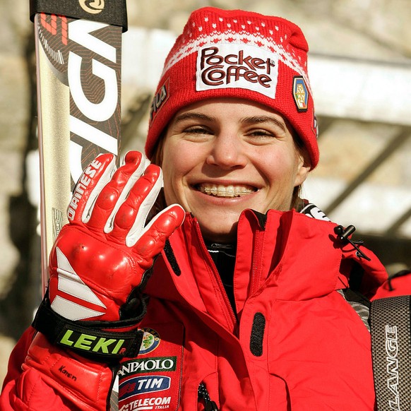 Karen Putzer of Italy celebrates her 4th place in a women&#039;s World Cup giant slalom in St. Moritz, Switzerland, Wednesday, Dec. 22, 2004. (KEYSTONE/AP Photo/Marco Trovati)