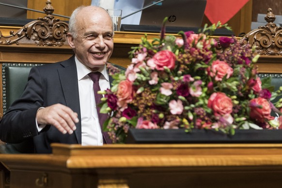 epa07209586 Ueli Maurer reacts after his election as Swiss Federal President for 2019, in the Parliament in Bern, Switzerlan, 05 December 2018. The Swiss President changes every year and is elected by ...