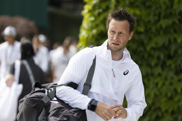 Dieter Kindlmann, coach of Swiss tennis player Dominic Stricker, arrives at the All England Lawn Tennis Championships in Wimbledon, London, Sunday, July 2, 2023. The Wimbledon Tennis Championships 202 ...