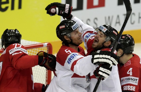 Austria&#039;s Thomas Raffl (L) celebrates his goal against Switzerland with team mate Manuel Latusa (R) during their Ice Hockey World Championship game at the O2 arena in Prague, Czech Republic May 2 ...