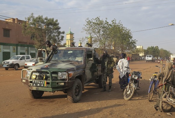 epa04875844 (FILE) A file picture dated 25 January 2013 shows Malian forces patrolling through the northern town of Sevare, Mali. Unknown rebels launched an attack on a key trading hub in northern Mal ...