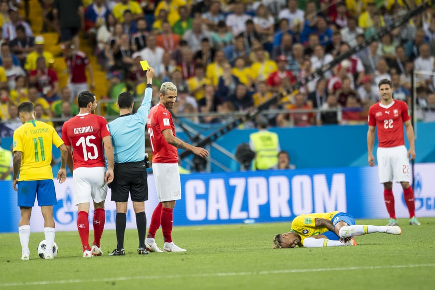 Switzerland&#039;s midfielder Valon Behrami, 3rd left, reacts next to Brazil&#039;s forward Neymar, right, during the FIFA soccer World Cup 2018 group E match between Switzerland and Brazil at the Ros ...