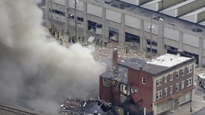 In this screen grab from video provided by WPVI-TV/6ABC, smoke rises from an explosion at the R.M. Palmer Co. plant in West Reading, Pa., Friday, March 24, 2023. (WPVI-TV/6ABC via AP)