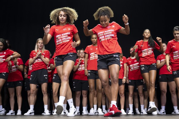 KEYPIX - Switzerland&#039;s Alayah Pilgrim, front-left, and Switzerland&#039;s Leila Wandeler, front-right, dance during a thank you and farewell event at the Fan Zone and public viewing on Federal Sq ...