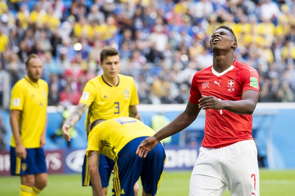 Switzerland&#039;s forward Breel Embolo, right, reacts during the FIFA World Cup 2018 round of 16 soccer match between Sweden and Switzerland at the Krestovski Stadium, in St. Petersburg, Russia, Tues ...