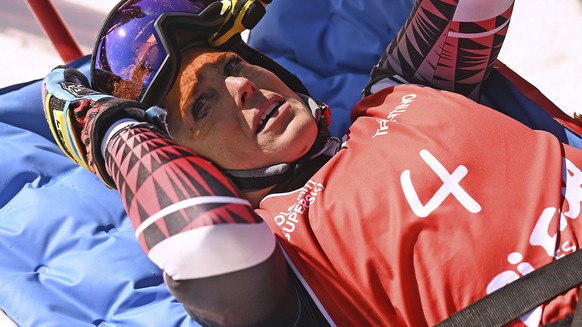 Italy&#039;s Federica Brignone is carried away on a toboga after she broke multiple bones in her left leg during a giant slalom crash at the Italian championships in the Lusia ski area, in Val di Fass ...