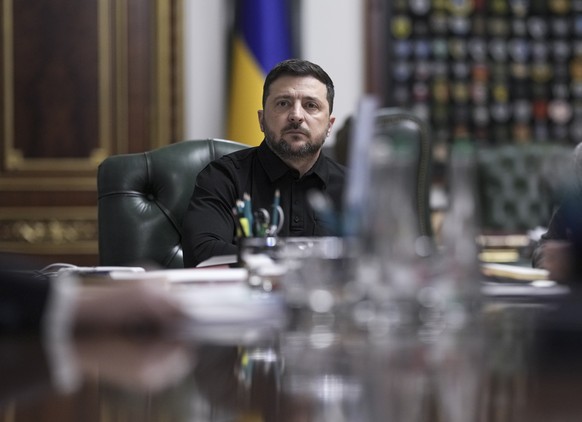 epa12501057 Ukrainian President Volodymyr Zelensky, together with Government members, speaks to the media during his briefing for journalists in Kyiv, Ukraine, 03 November 2025. Zelensky discussed the ...