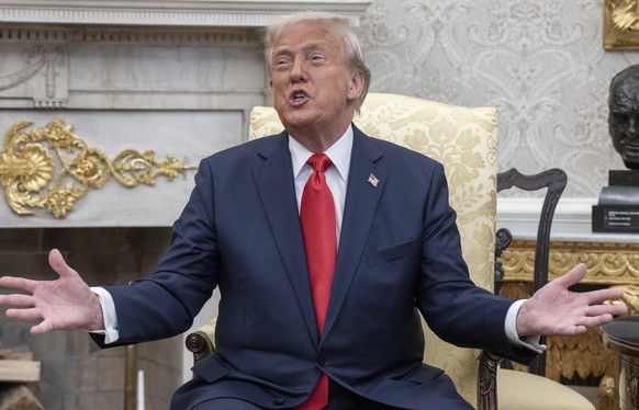 epa12032049 US President Donald Trump meets with El Salvador president in the Oval Office at the White House in Washington, DC, USA, 14 April 2025. President Bukele meets with President Trump as contr ...