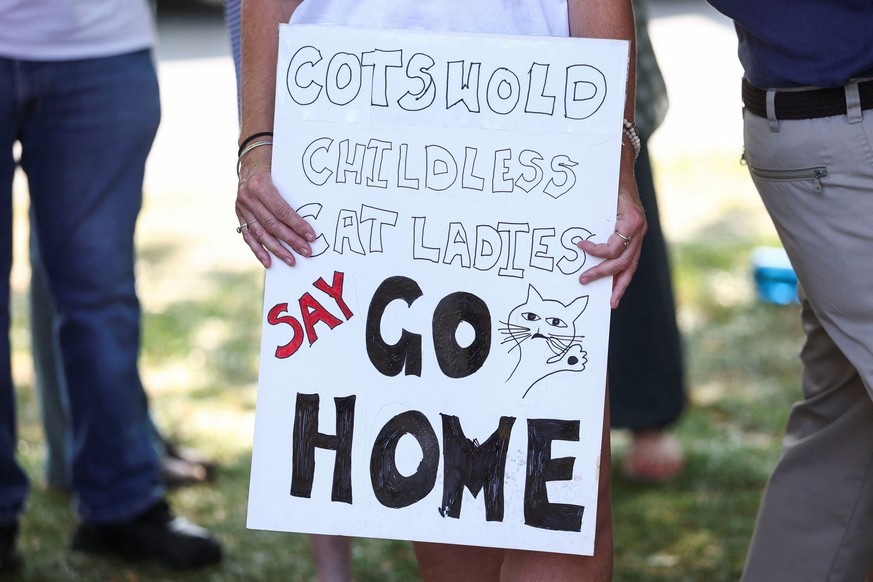 People attend the &quot;Vance not welcome party&quot; protest, organised by Everybody Hates Elon and Stop Trump Coalition, as U.S. Vice President JD Vance spends his holiday nearby, in Charlbury, Cots ...