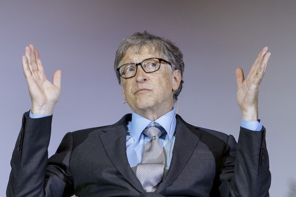 epa12487429 (FILE) - Bill Gates gestures as he talks during a conference about the innovations for a healthy future in Africa, at the Technical University (TU) in Berlin, Germany, 15 October 2018 (rei ...