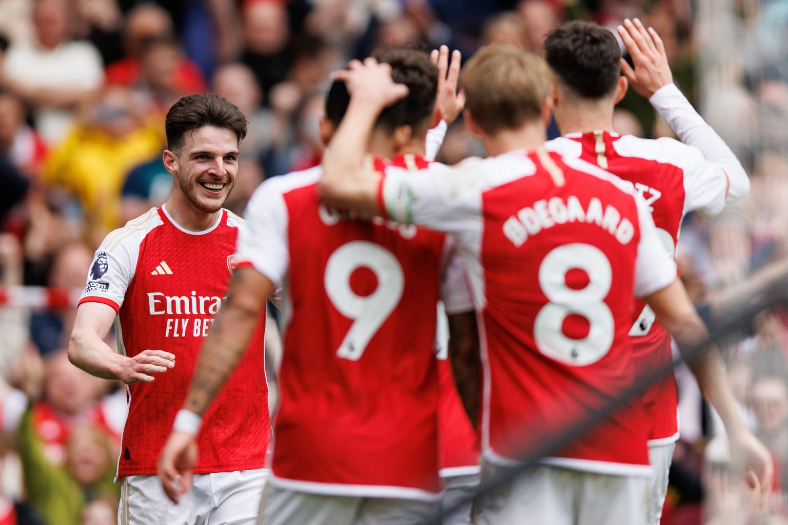 epa11317918 Declan Rice of Arsenal celebrates after scoring 3-0 goal during the English Premier League soccer match of Arsenal FC against AFC Bournemouth, in London, Britain, 04 May 2024. EPA/TOLGA AK ...