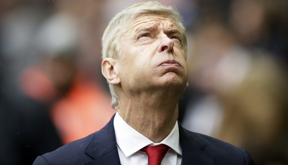 FILE - In this Saturday, Feb. 10, 2018 file photo, Arsenal's manager Arsene Wenger looks on before their English Premier League soccer match against Tottenham Hotspur at Wembley Stadium, London. ...