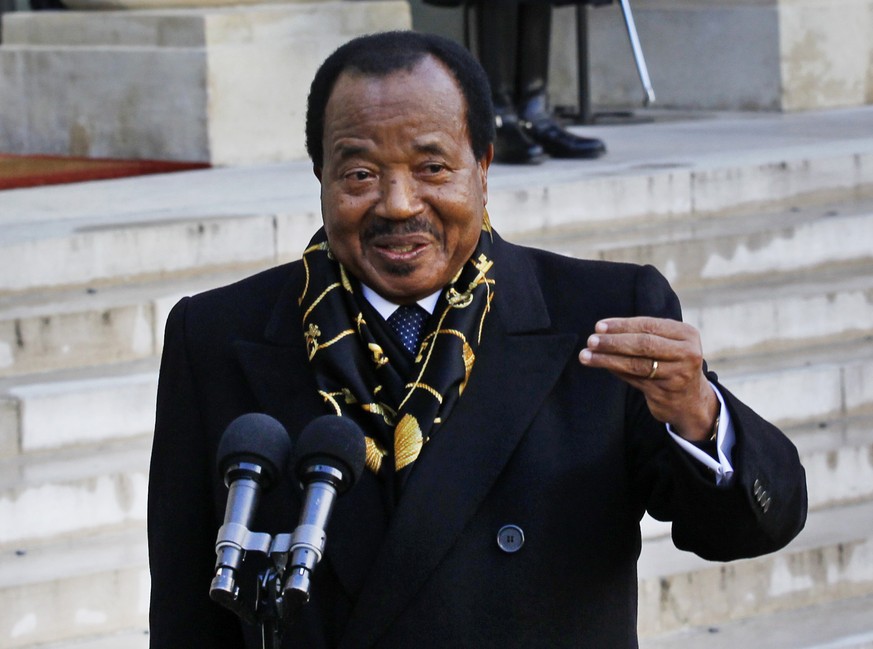 FILE - In this Jan 30, 2013 file photo Cameroon&#039;s President Paul Biya addresses reporters following his meeting with French President Francois Hollande at the Elyse Palace in Paris. Biya, in powe ...