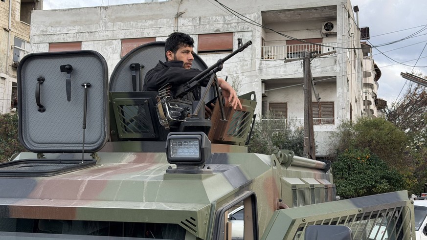 Curfew imposed in Latakia, Syria LATAKIA, SYRIA DECEMBER 30: Syrian security forces patrol streets in Latakia after a citywide curfew was imposed, remaining in effect until 06:00 on Wednesday, in Lata ...